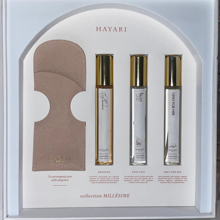 inside the box with 3 bottles of our bestsellers in small format with a pink velvet pouch and a dedication from Mr Hayari