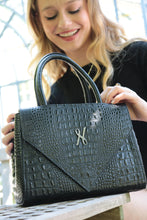 Load image into Gallery viewer, The Beaux-Arts bag charms with its unique round shape and elegant design in black croco