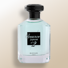 Load image into Gallery viewer, Source joyeuse n°2 eau de parfum in a clear bottle with black elements. Blue juice perfume