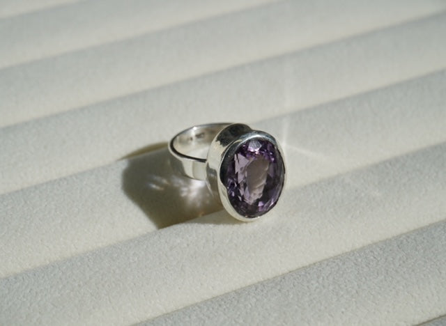 Silver ring with cut Amethyst