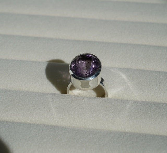 Silver ring with cut Amethyst