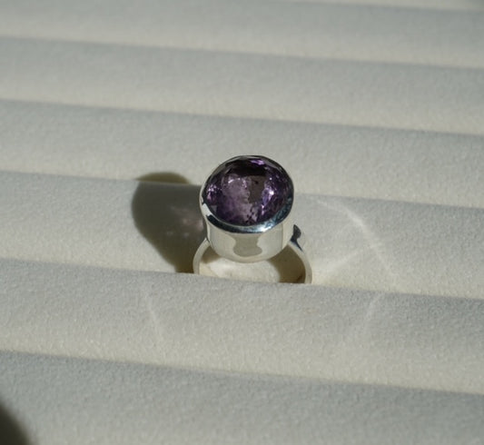 Silver ring with cut Amethyst