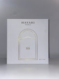 White box with gold engraving of Hayari doors 