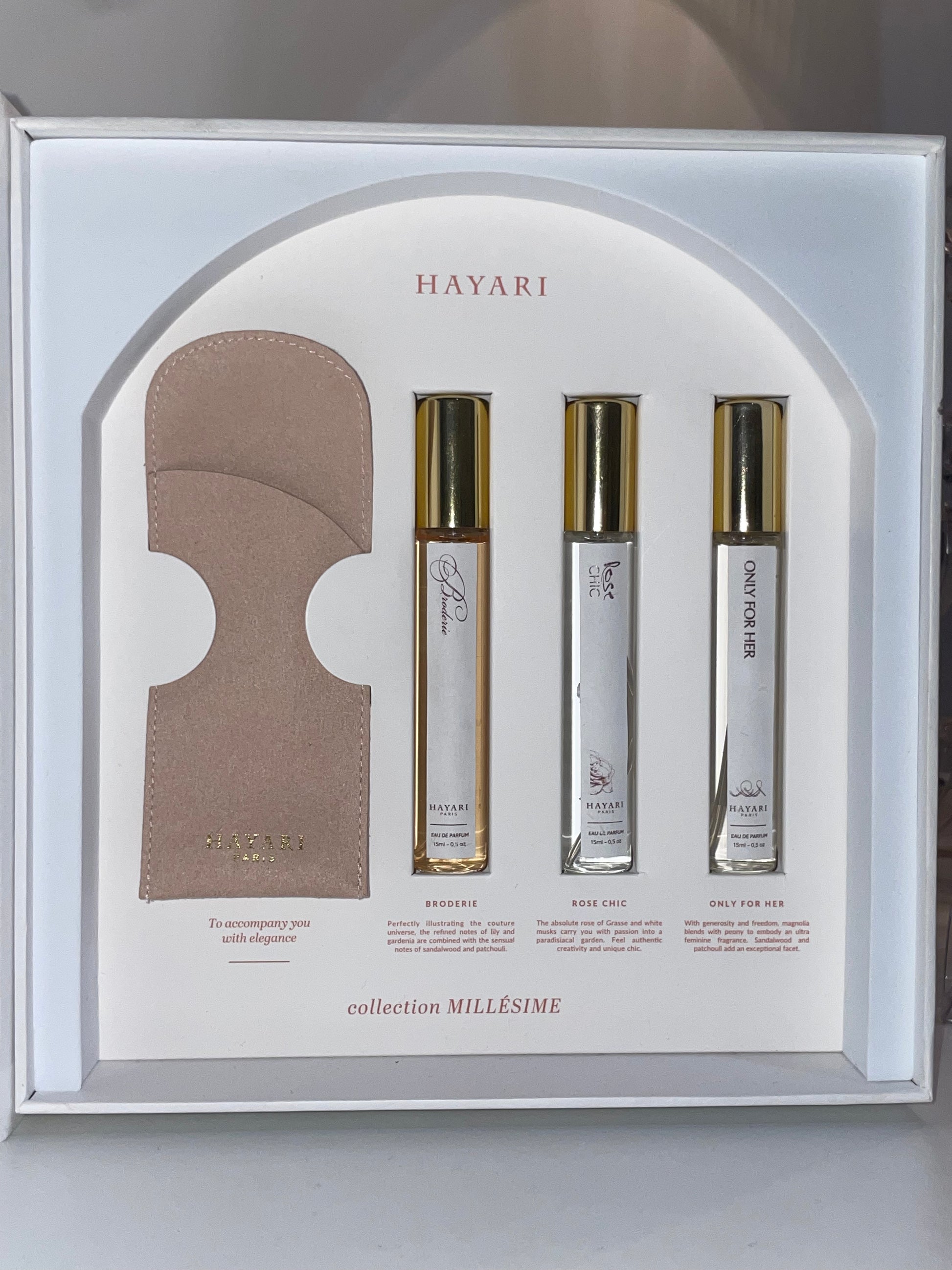 inside the box with 3 bottles of our bestsellers in small format with a pink velvet pouch and a dedication from Mr Hayari 