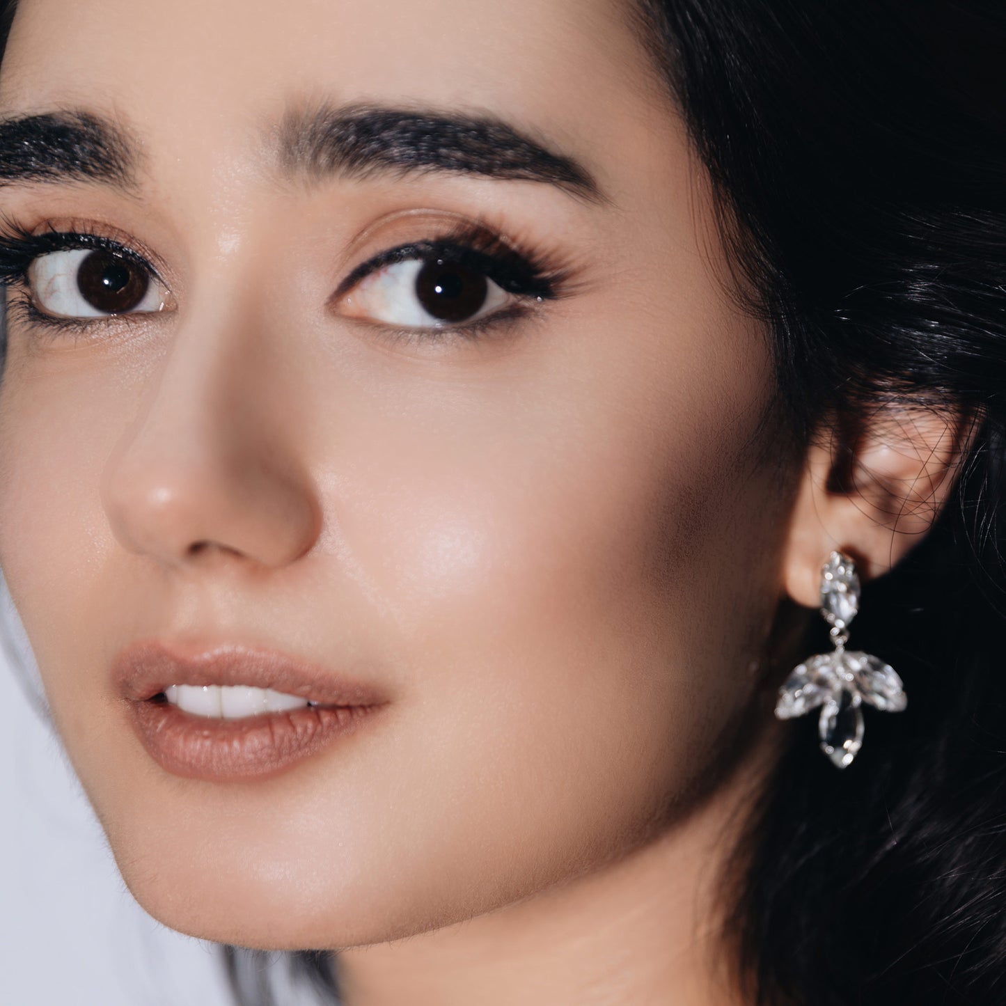 flower petal pendant earrings in silver and clear crystals