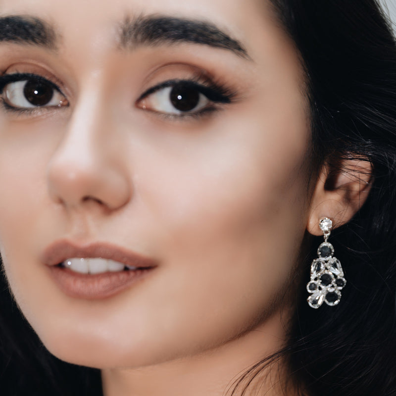 cluster earrings withnhigh-quality white and black crystals 