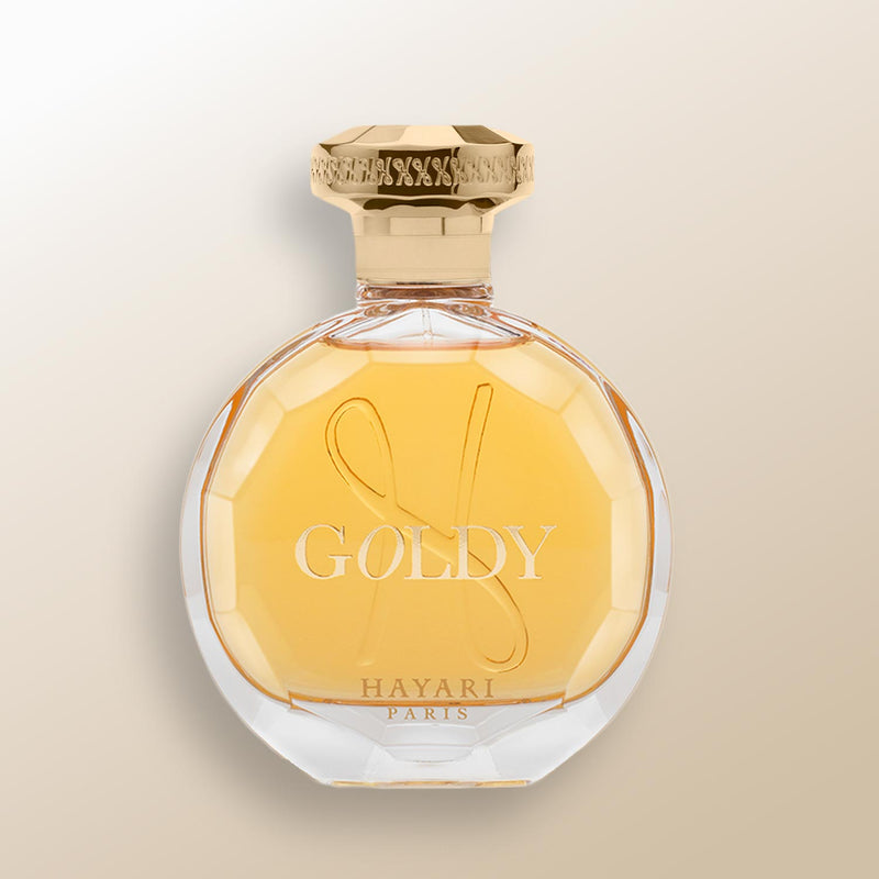 goldy eau de parfum for women in a clear bottle with gold cap