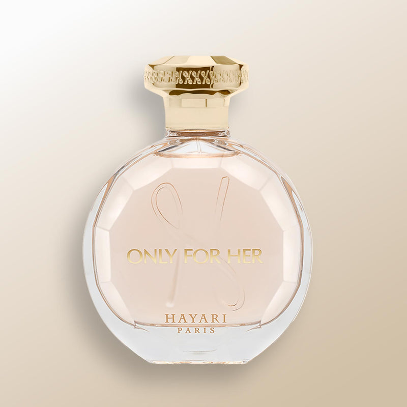 only for her by hayari paris, elegant clear bottle with pink juice perfume, gold cap and writing 